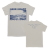 BHC! The Have Heart "Road" shirt comes on natural with blue ink. It features the band's name written above a photograph of the open road on the front with "PAVE PARADISE" written underneath. The back of the shirt has handwritten lyrics. This design is printed on Gildan.