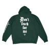 Knocked Loose's "Don't Reach Oval" design, printed on the front, back and left sleeve of a forest green Gildan hoodie.