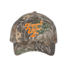 Trapped Under Ice's stacked logo embroidered in orange and white on the front of a camo hat.