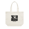 Turnstile's "Flip" design, printed on the front and back of a natural canvas tote bag.  Tote features: Reinforced should straps; one large main compartment; Mid weight, 9.4 oz/yd2; 100% cotton canvas.
